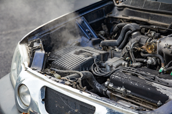 Why is There Smoke Coming from Underneath My Car's Hood?