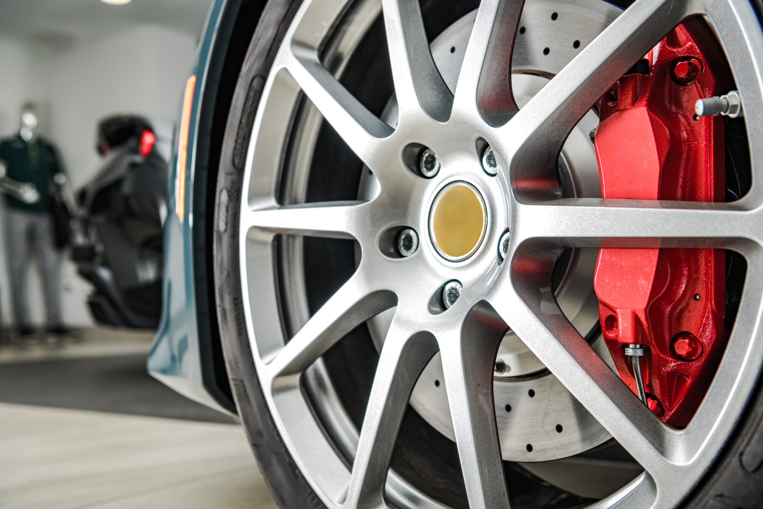 Exotic Car Performance Alloy Wheel Close Up. Automotive Industry Theme.
